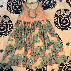 Girls dress with unicorns